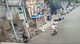 That was close! Woman narrowly escapes collapsing building in Hyderabad, India