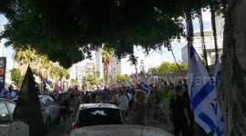 Submarine-wielding protesters in Israel mock Netanyahu corruption charges and demand his resignation