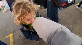 Kids and coffee don't mix! Child spits out java on dad's leg