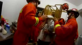 Chinese firefighters rescue toddler after his head gets stuck in stroller