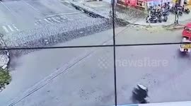Motorcycle Rider Crashes Into Razor Wire During Indonesia Protests