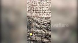 Woman saved after falling into deep well in southern India