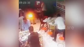 Huge ball of fire bursts out of cigarette as Chinese man lights it in restaurant with gas leak