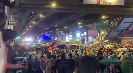 Police fire water cannon at demonstrators in Bangkok as anti-government protests continue