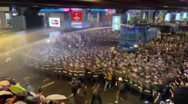 Thailand: After Tense Standoff, Police Use Water Cannon To Disperse Protesters