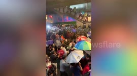 Police fire water cannon at protesters in Bangkok, Thailand