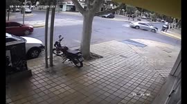 Car collided and ran over a woman carrying her baby in a stroller