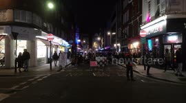 People in Soho London eat before the tier 2 lockdown
