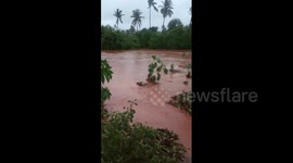 Flooding near iron mine turns river 'red' in western India