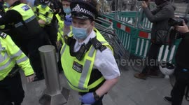 Batons out as UK police clash with protesters during London anti-lockdown protest