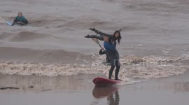 Surf’s up! UK thrillseekers flock to highest Severn Bore of the year