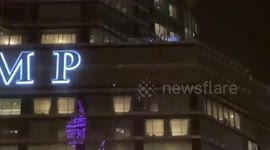 US: Man Dangles From Rope Outside Of Trump Tower In Chicago