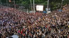 Thousands sing national anthem on 7th day of protest in Thailand