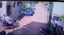 Two thieves carry away bike on motorcycle in funny way