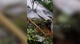 Homes damaged after landslides in central Vietnam