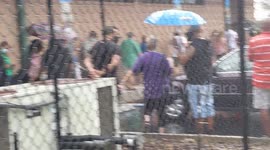 Amid thunderstorm, Orlando voters brave long lines to vote early in Florida