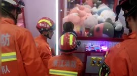 Firefighters free 4-year-old girl stuck inside claw machine in eastern China