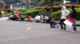 funny action of students during a demonstration against omnibuslaw in Jakarta