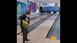 kid at bowling