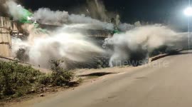 Controlled demolition of old bridge on highway in north India