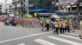 Small group of protesters march in support of monarchy in Bangkok