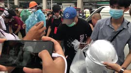 Helmets handed out to pro-democracy protesters in Thailand