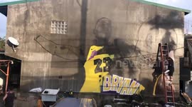 Basketball fan paints stunning LA Lakers victory mural in the Philippines