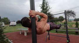 Muscular guy doing dragon flag exercise!