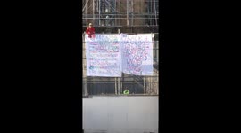 Man dressed as Spider-Man joins Extinction Rebellion protests on Big Ben scaffolding