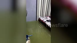 Filipino Man Sleeps Through Flooded Room From Storm Saudel