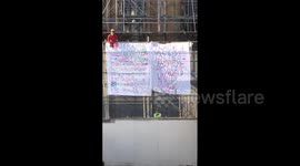 UK: Man In Baggy Spiderman Garb Scales Elizabeth Tower Scaffolding To Protest Multiple Issues
