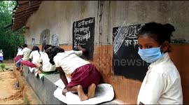 COVID-19 forces teachers to convert village huts into blackboards in India