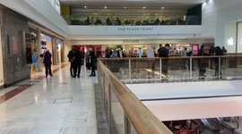 People line up to buy the iPhone 12 at Apple Brent Cross