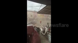 Buildings damaged as whirlwind batters town near Jakarta