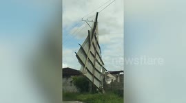 Storm blows roof onto power lines in the Philippines