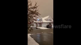 US: While Sleeting And Snowing, Minnesota Sky Takes On A Sepia Tone Due To Colorado Wildfires Smoke