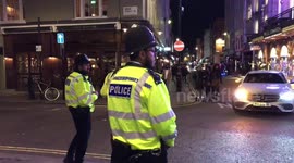 UK drinkers crowd streets of Soho after 10 pm curfew