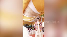 Storm blows over wedding marquee in Indonesia