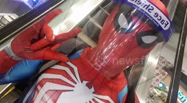 Filipino man goes shopping in Spider-man costume