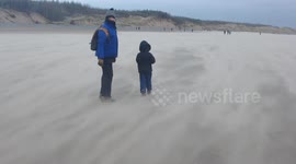 shifting sand in wind