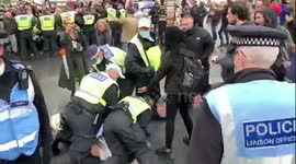 Cops haul anti-lockdown demonstrator to ground during central London protest