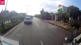 Heart-stopping moment truck driver slams brakes as pensioner ambles into road