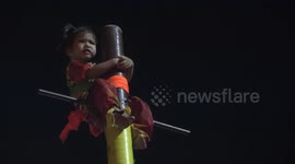 Two-year-old girl is catapulted in the air and dangled upside down at Thai festival