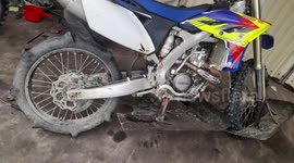 Motorbike turned into improvised jet-ski to get through Cambodia floods