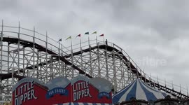 21 year old Man try's to jump off roller coaster