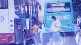 Bus drags girl along road after doors close on her leg in central China