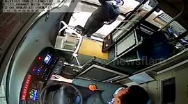 Man finishes bottle of Chinese liquor after being told he can't carry it on bus