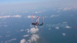 Acrobatic skydiving over Dunk island