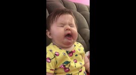 Baby pulls range of hilarious faces as she eats sour fruit for the first time