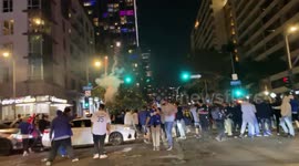Dodgers fans fan celebrating in downtown LA